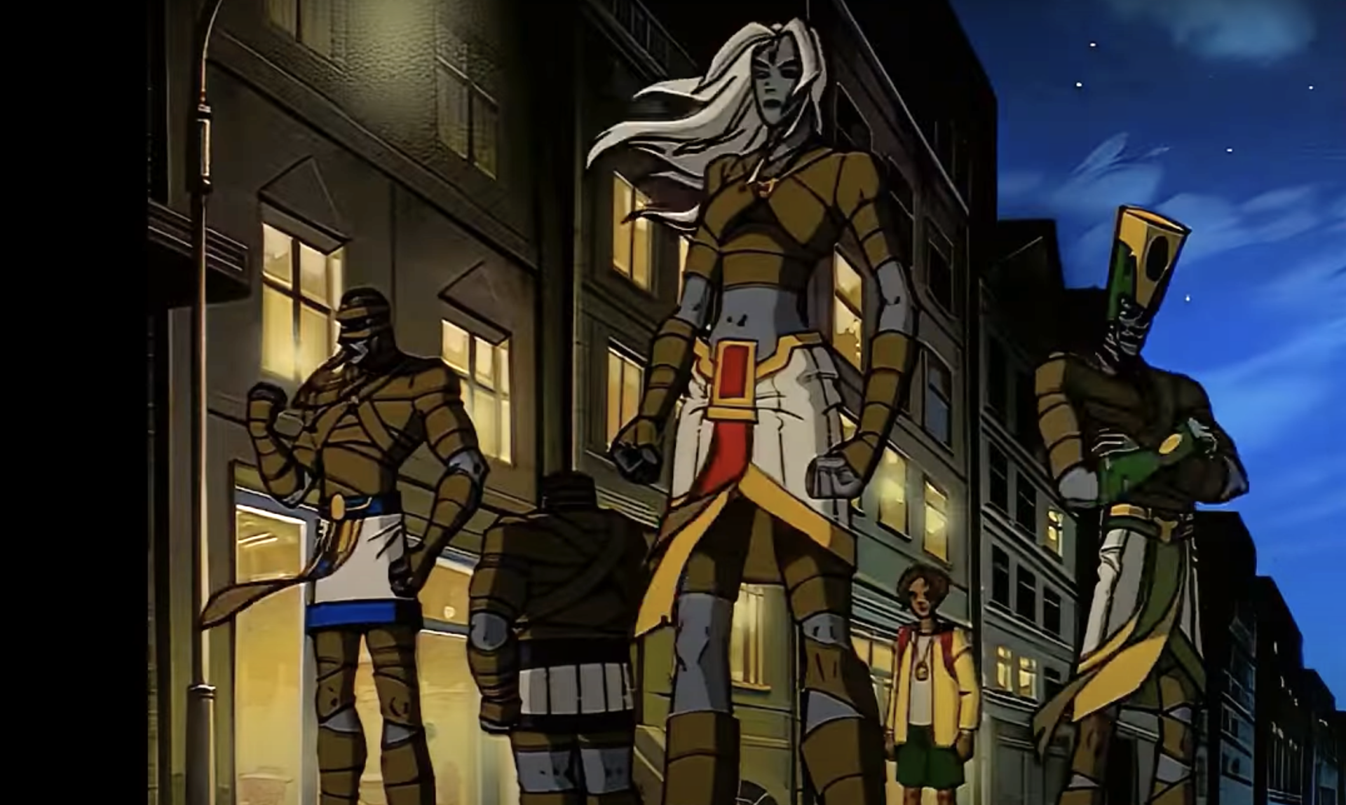 An illustration of four mummies and a pre-teen boy.