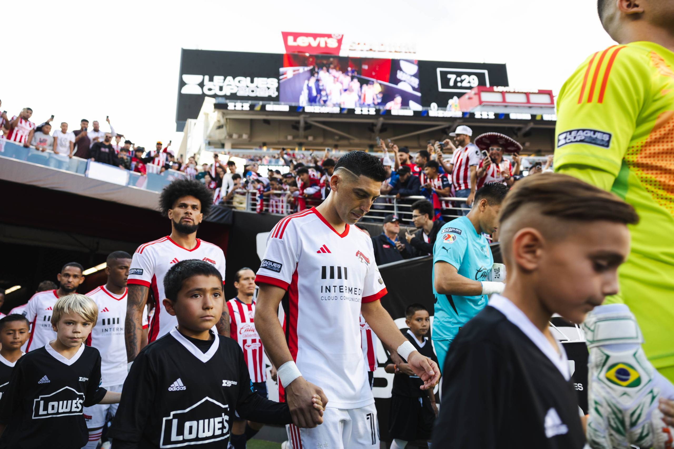 professional soccer players take the field during a game at Levi's Stadium