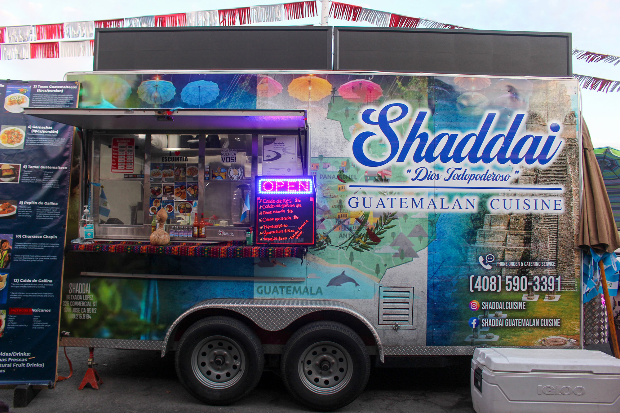 A food truck. The name on the logo reads, "Shaddai Guatemalan Cuisine."