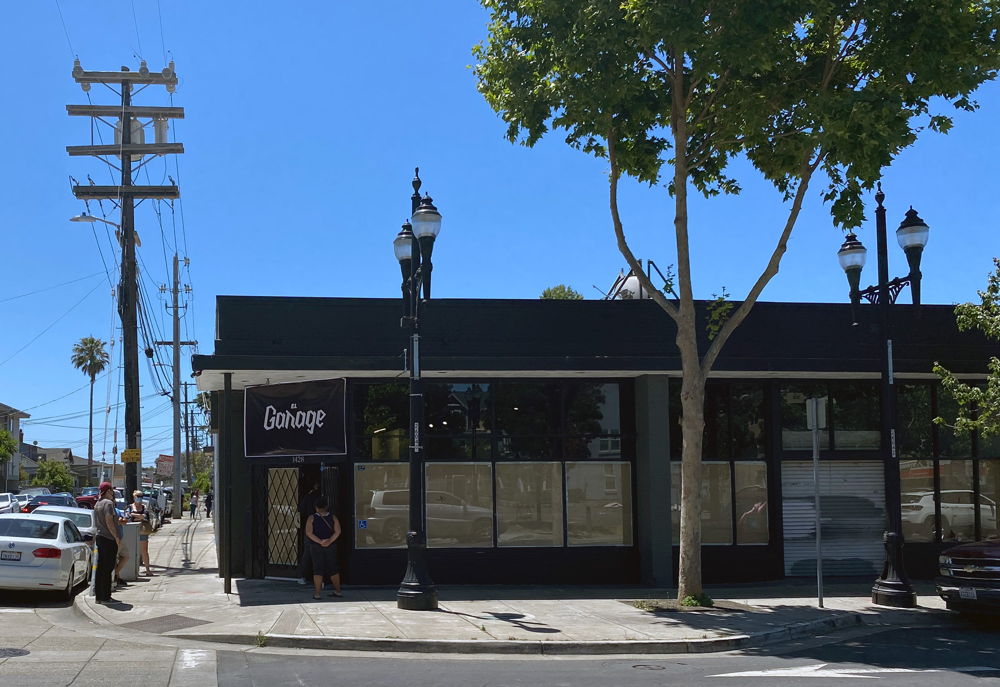 Exterior of El Garage taqueria on a sunny day.