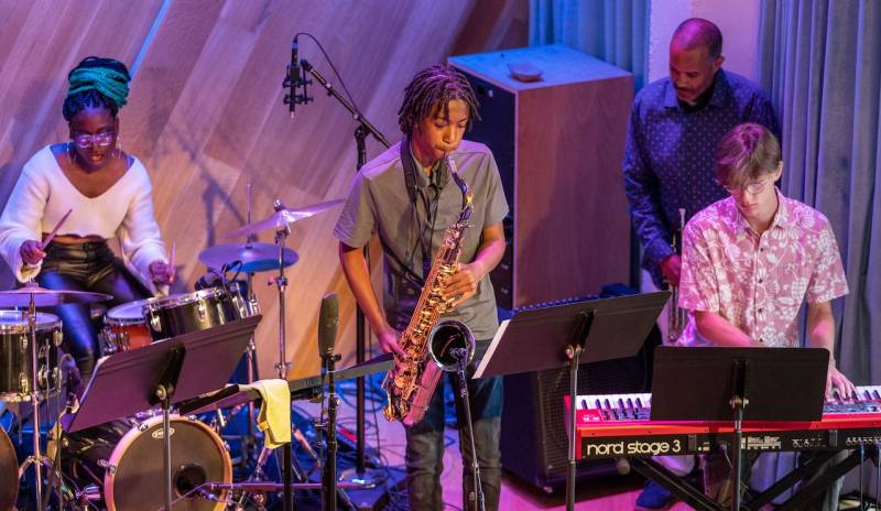 Oaktown Jazz Workshops' Performance Ensemble at Bandcamp Record Store and Performance Space in Oakland (left to right: Jayla Hernandez, Ayo Brame, Geachi Taylor and Ben Eichel).