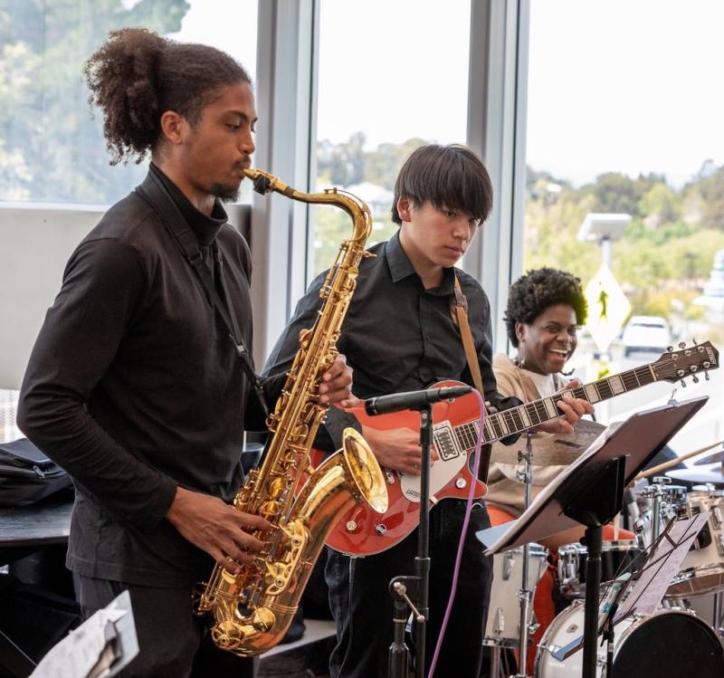 Oaktown Jazz Workshops' Performance Ensemble at the Hercules Public Library (left to right: Jordon Dabney, Teo Quale and Jayla Hernandez).