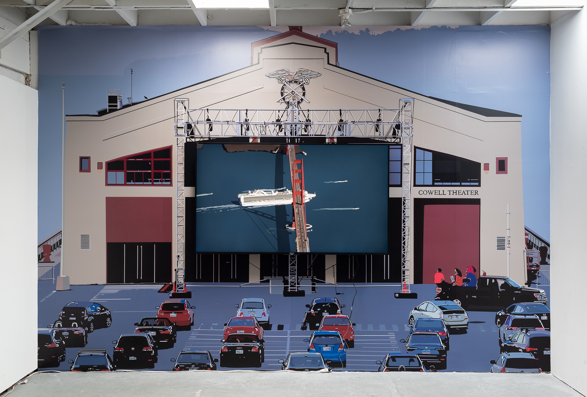 vinyl on wall of drive-in movie theater with view of cruise ship going under golden gate bridge