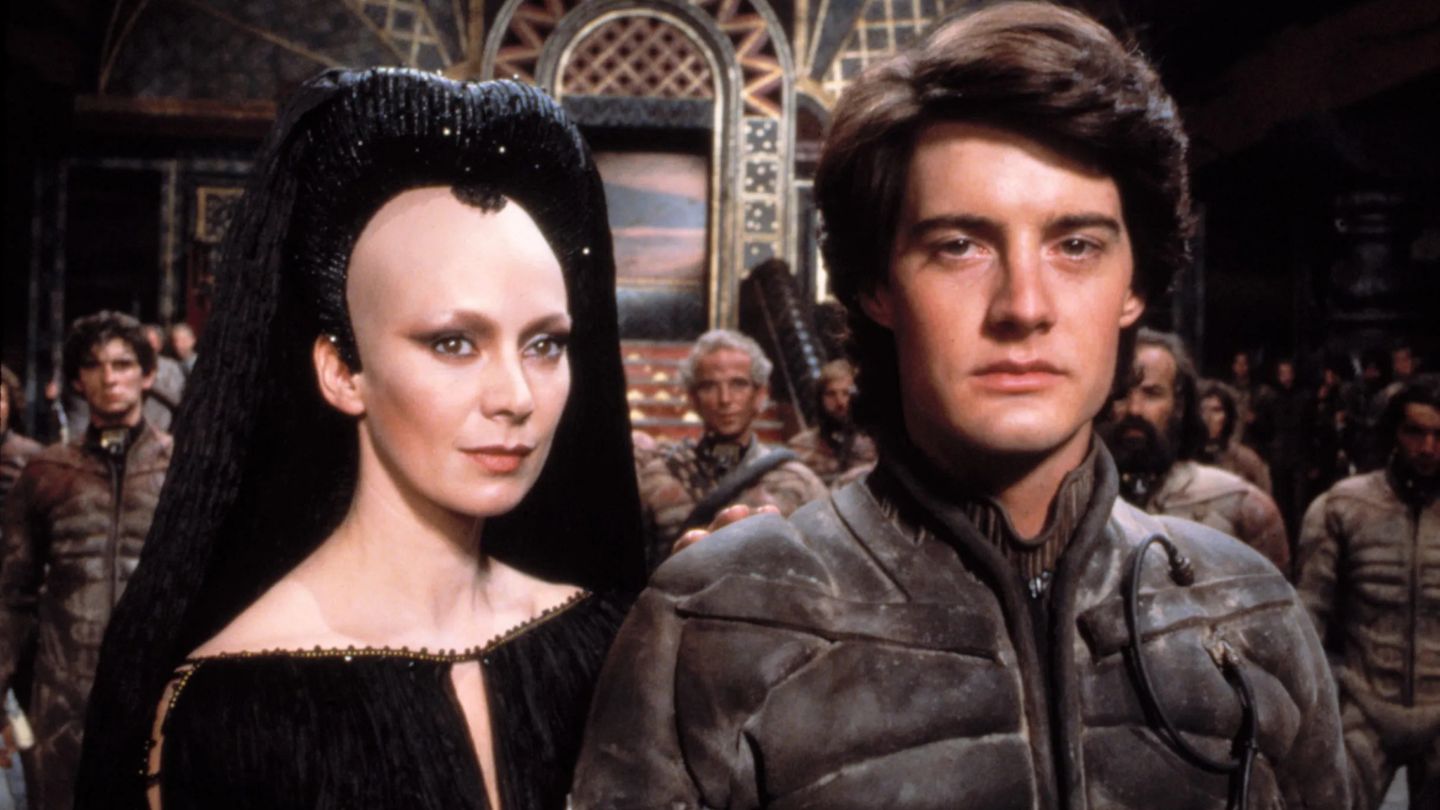 white woman and young man in sci-fi attire