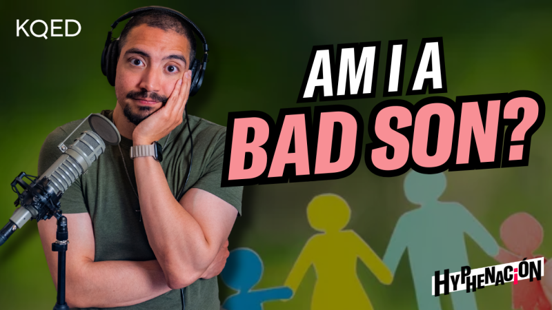 Person in green shirt standing behind a microphone shrugs with words "Am I a Bad Son?" across the image