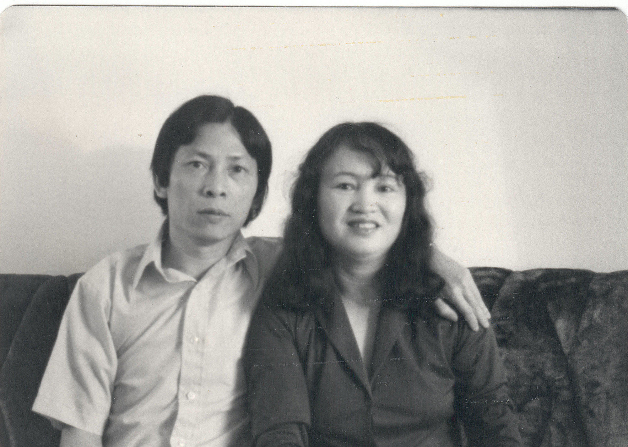 Black and white photo of an Asian couple.