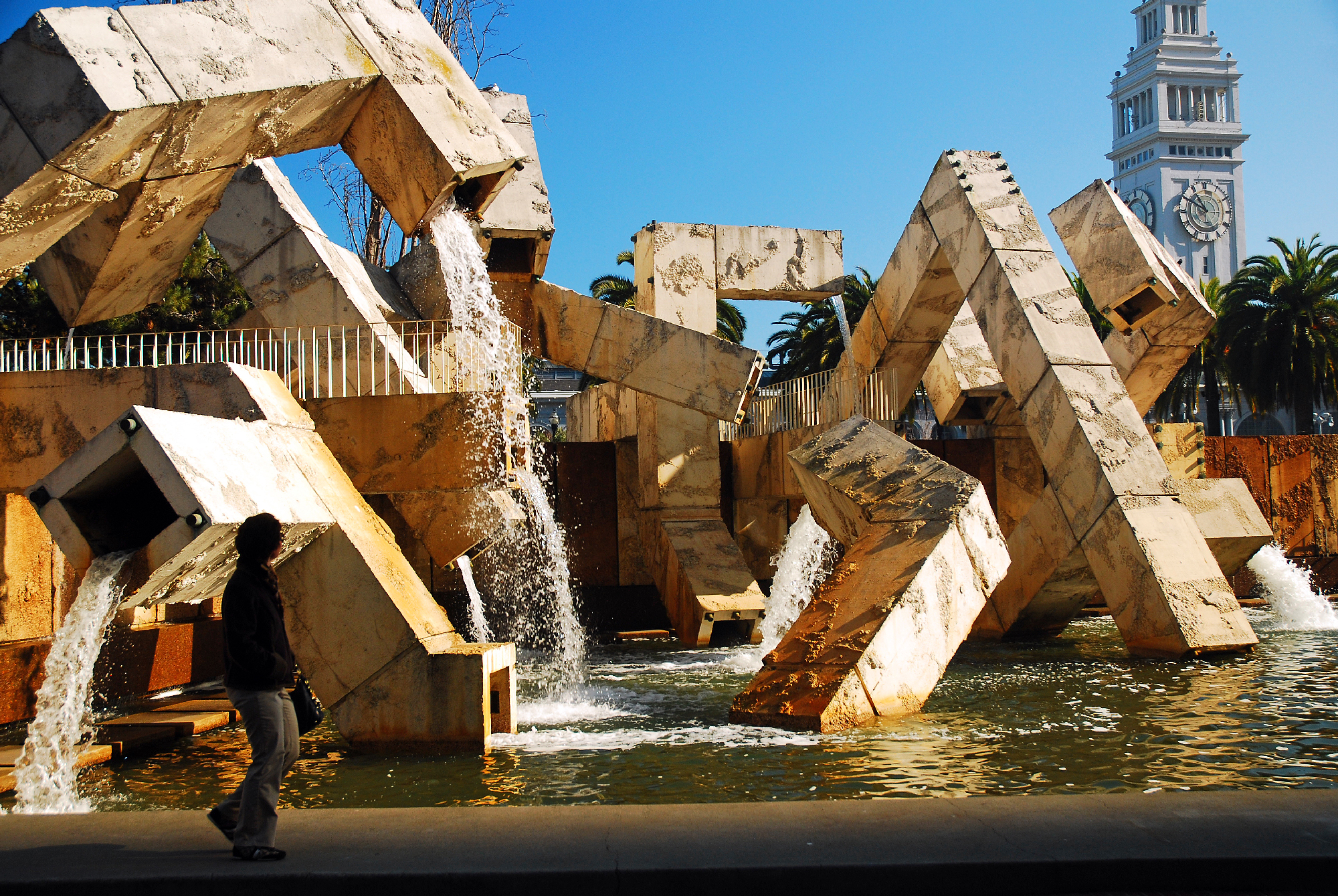 angular tubes of concrete in fountain with Ferry Building in background