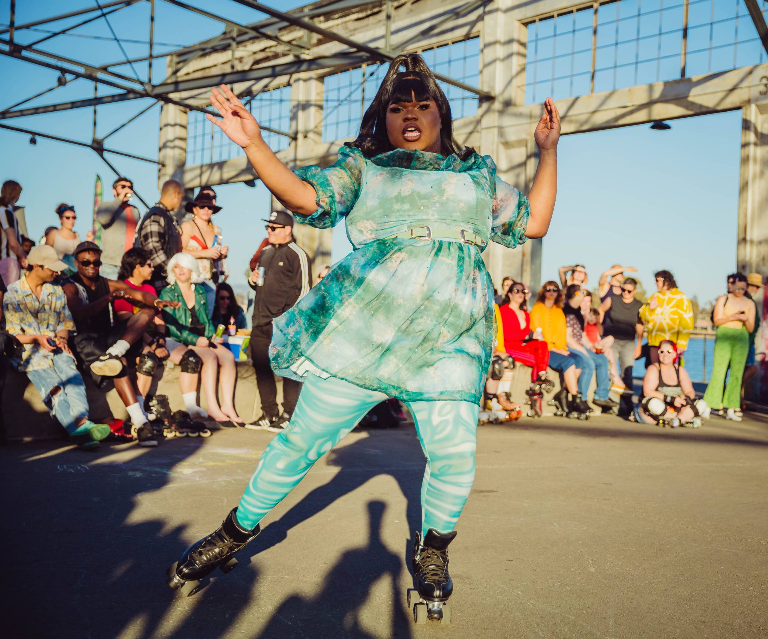 A drag performer on roller skates. 