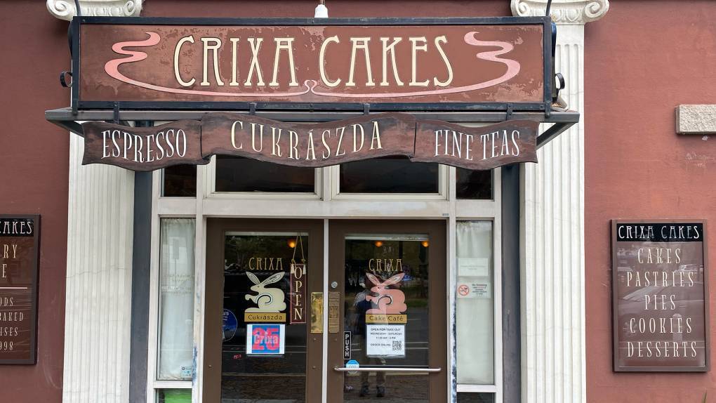 Exterior of bakery. The sign reads "Crixa Cakes."
