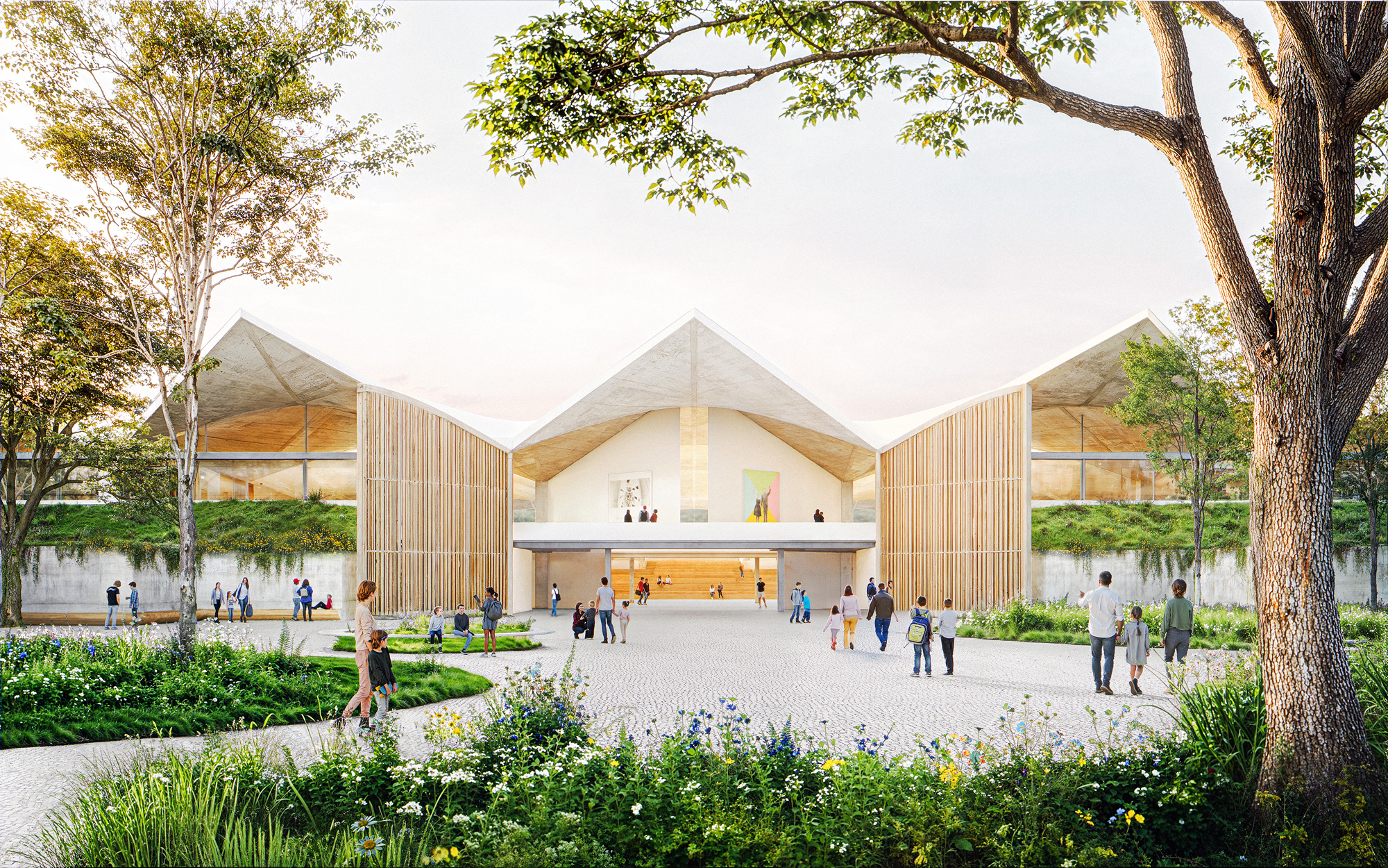 people walking around well planted open plaza with vaulted roofline above