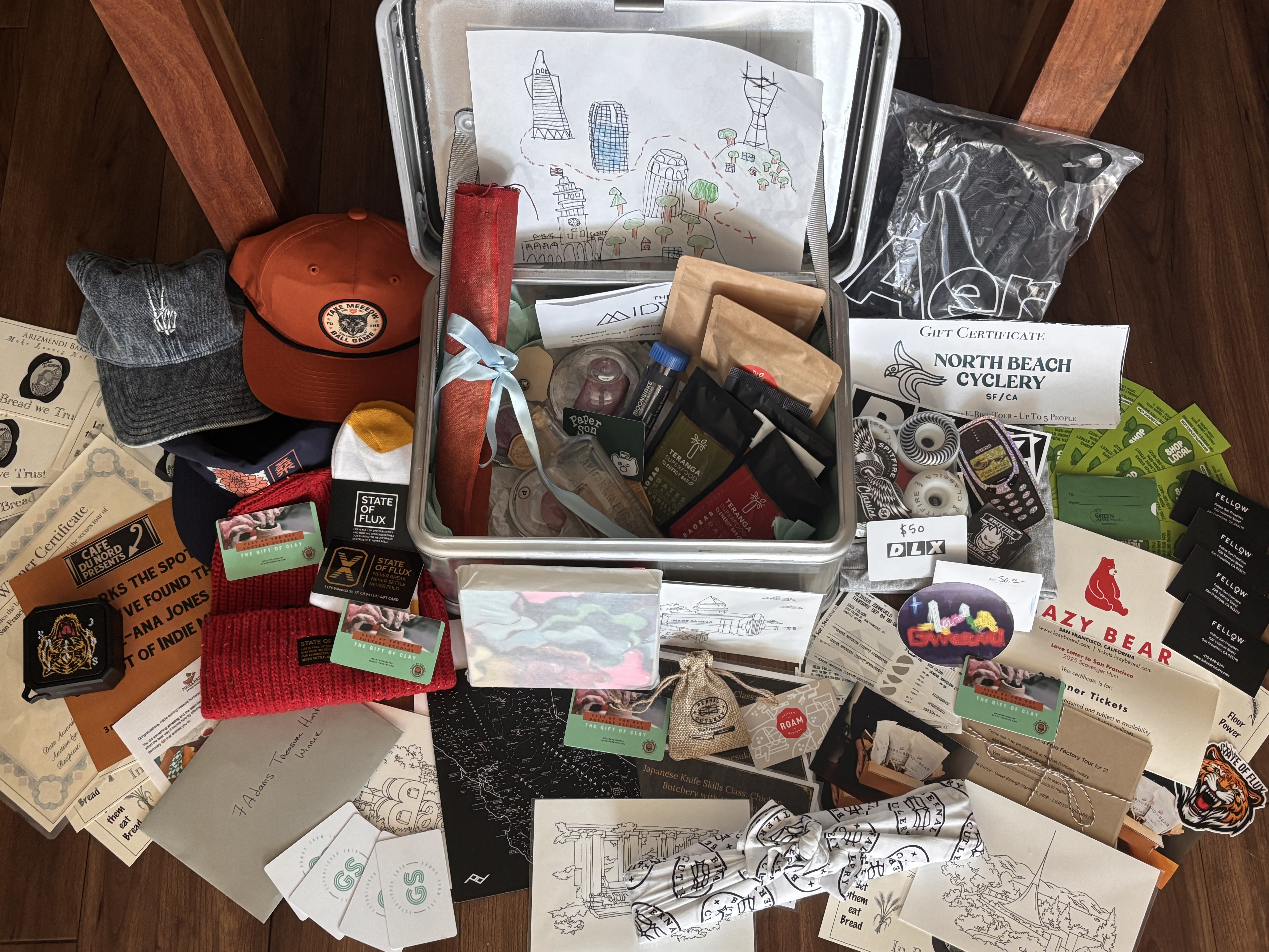 A treasure chest with gift cards, certificates and other small items. 