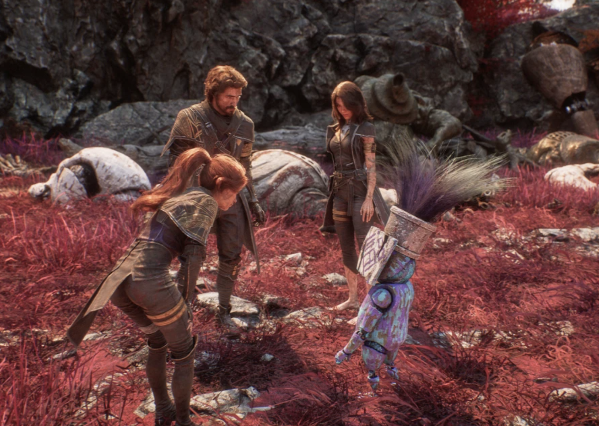 Video game graphics show two women and a man wearing unusual uniforms and protective clothing stand on a red landscape and converse with a small multicolored robot.