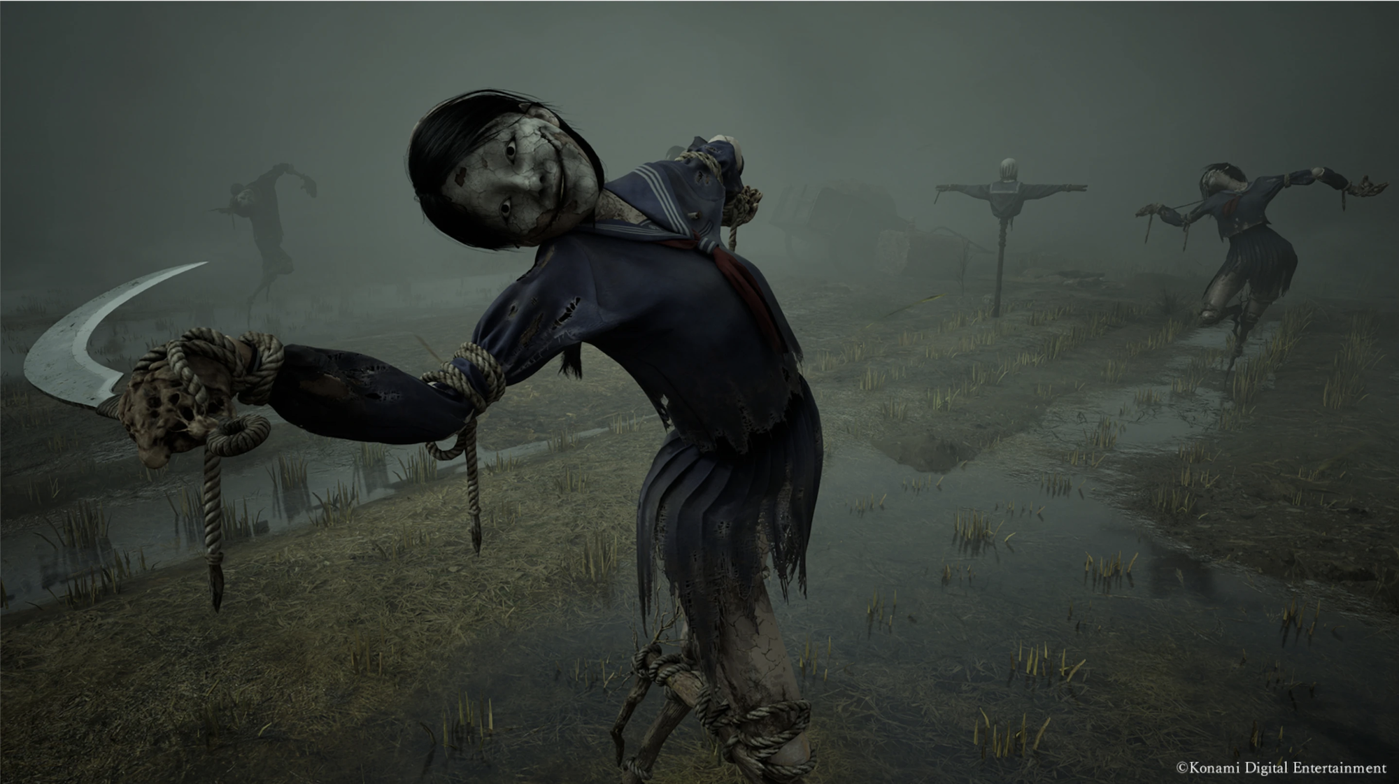 Two rag-doll-looking figures stand in a foggy field, grinning and waving scythes. Around them are half-bodies mounted on sticks.