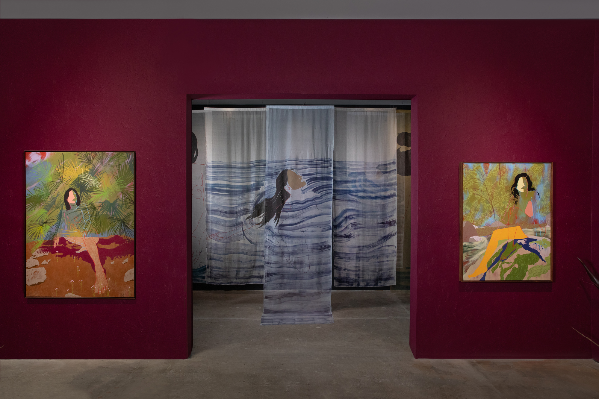 paintings frame doorway with hanging silk pieces