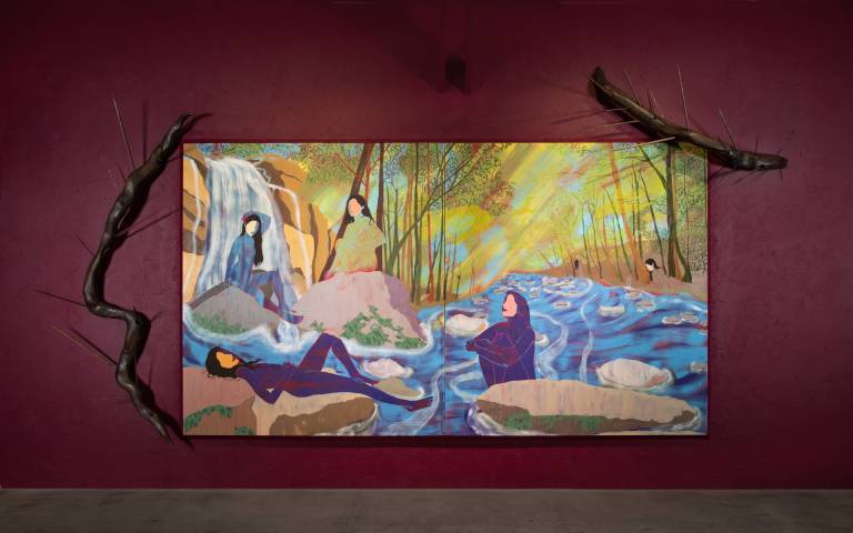 wide landscape painting with nude figures lounging, framed by spiky wooden sculptures