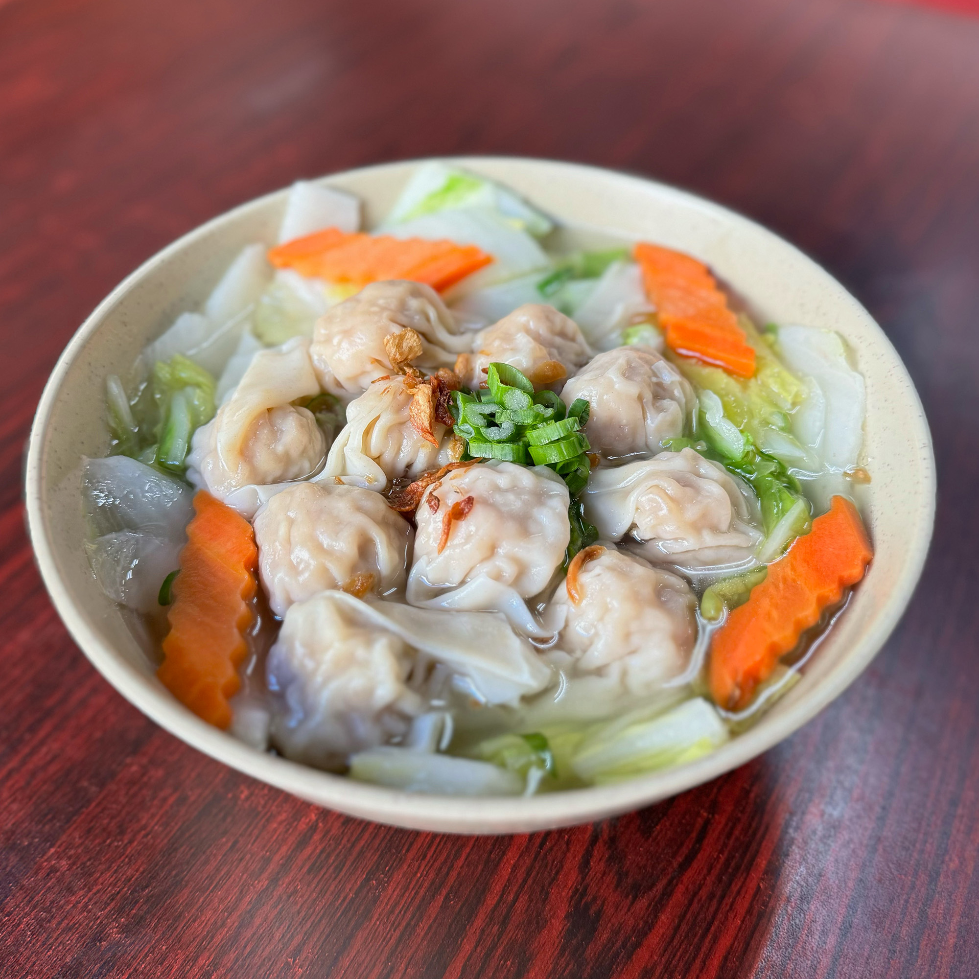 A bowl of wonton soup.