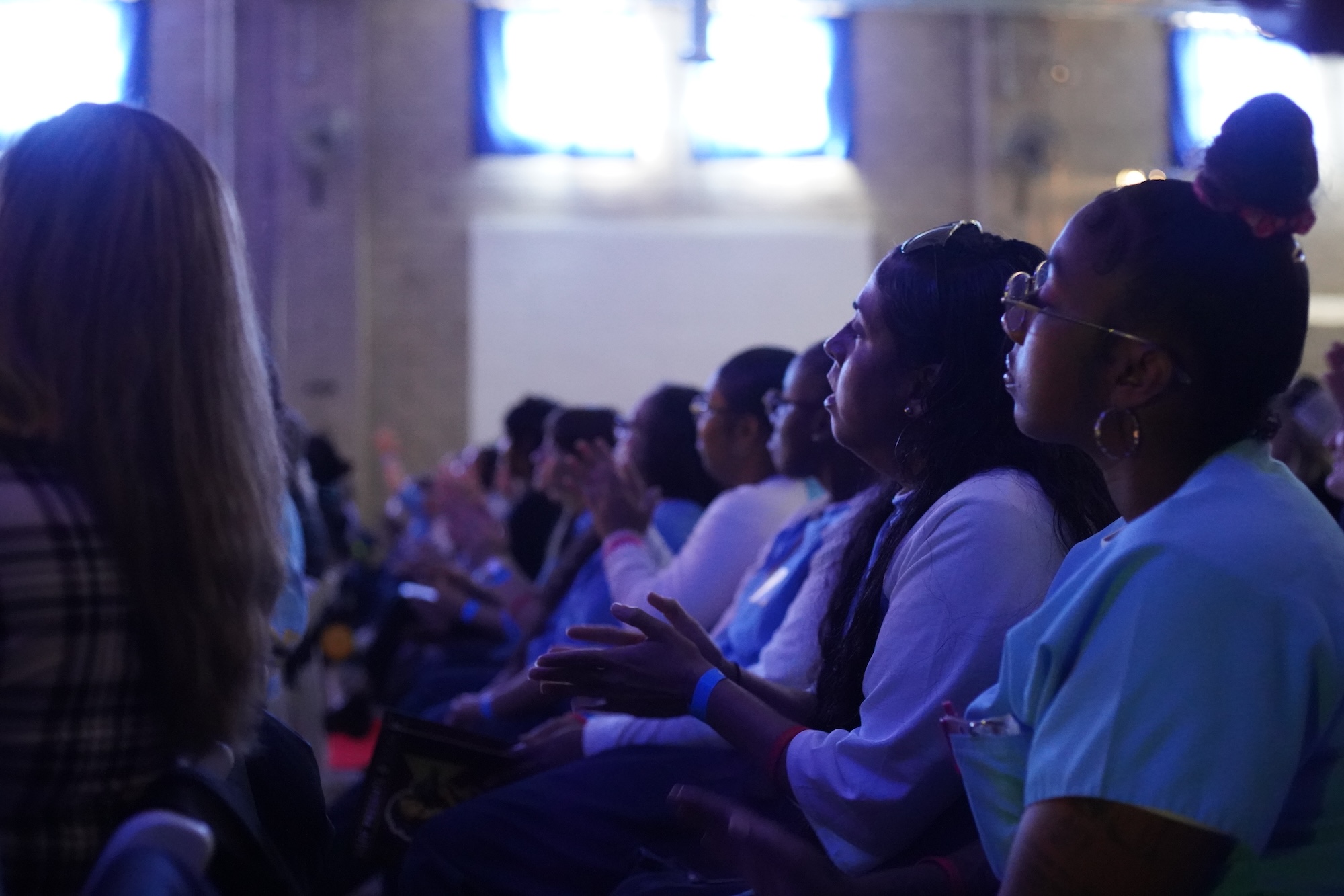 People applaud during presentations at the San Quentin Film Festival at the Central California Women's Facility. 