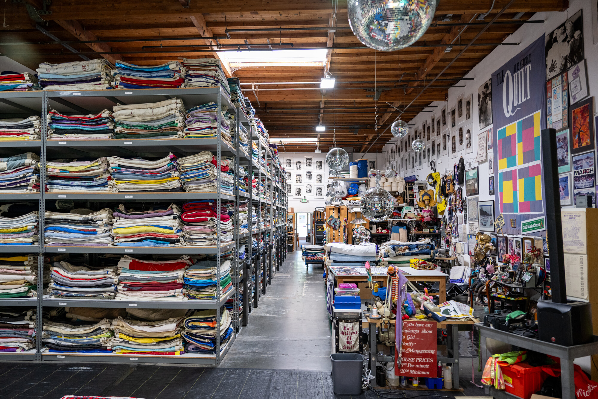 view into storage space with folded quilts stacked high on shelves