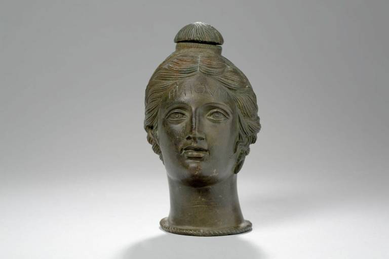 woman's head with inscription on forehead