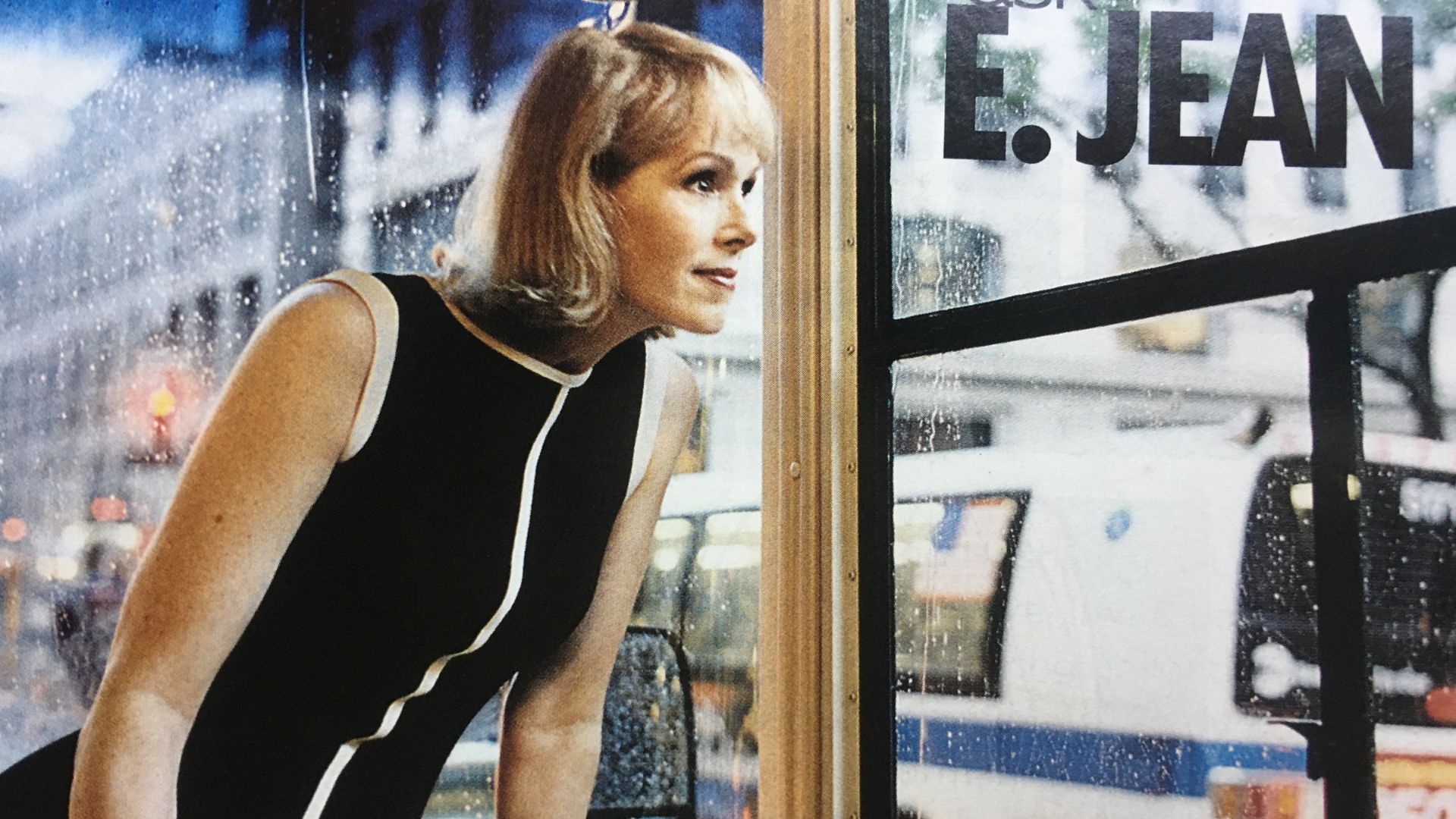 white woman with blonde bob leans forward in magazine image