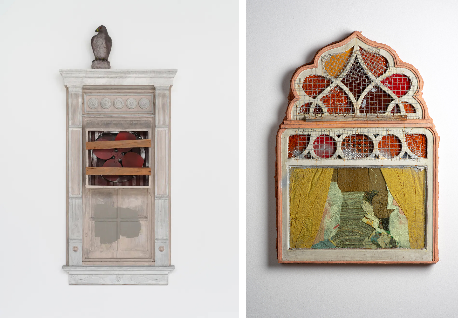 two wall-mounted sculptures of architectural objects: a fan vent and a window full of stuff