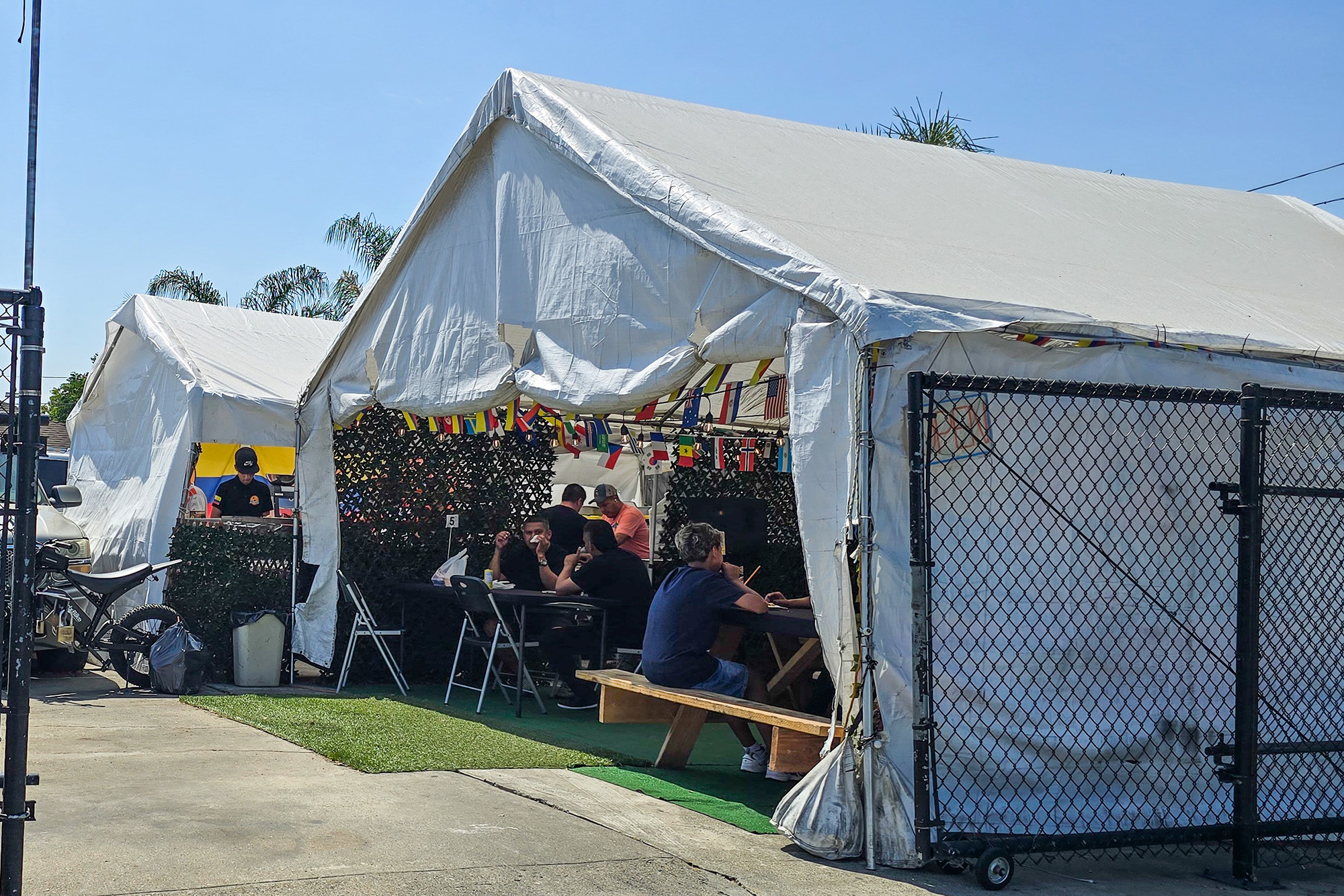 A food tent crowded with diners.