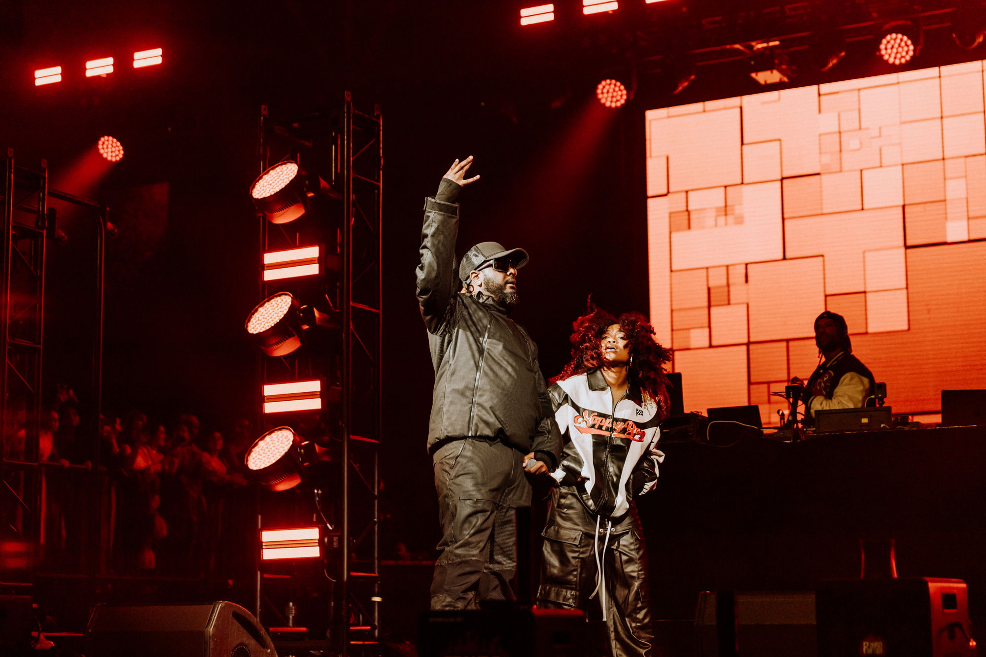 two Black performers on stage