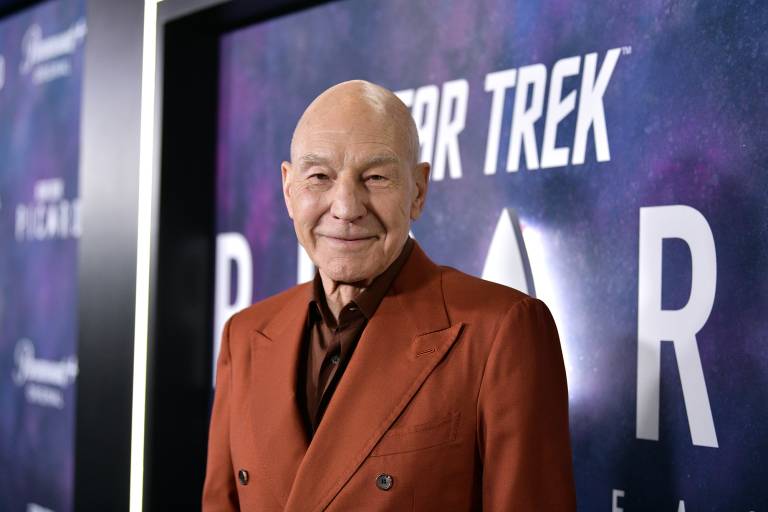 A man looks into the camera