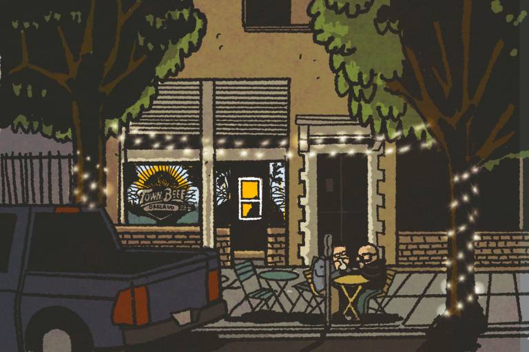 Illustration: Two men eat at a sidewalk table on a dark empty street.