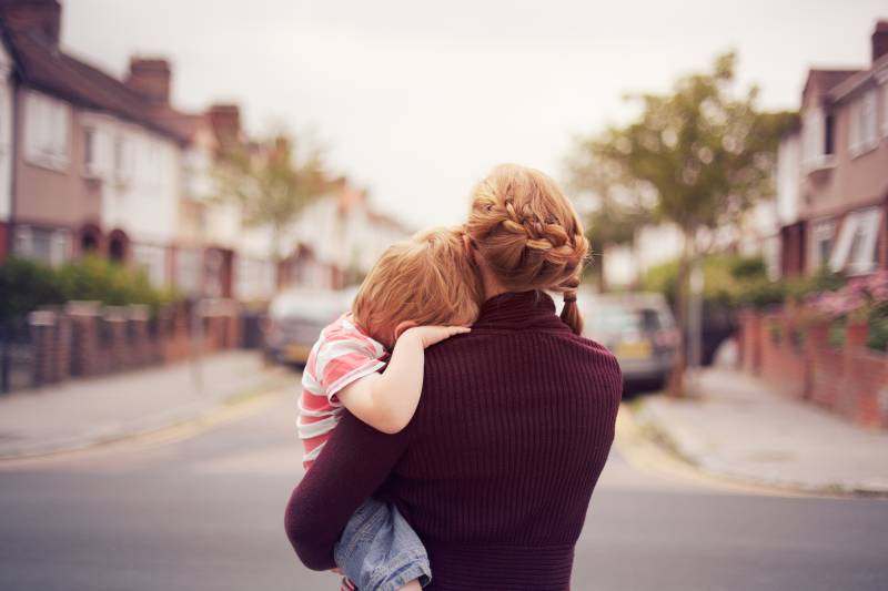 Parent holding child