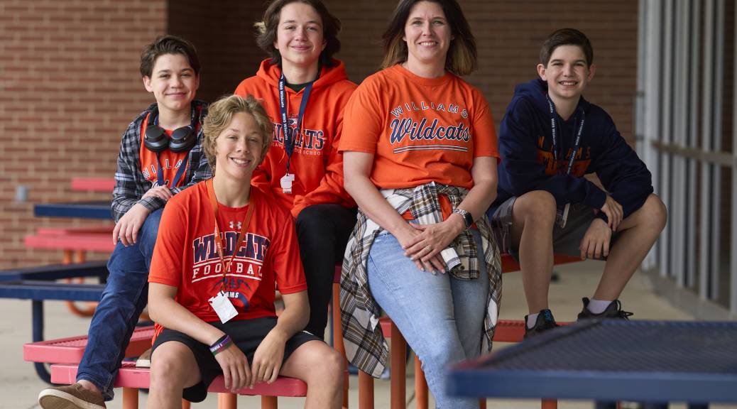 Four students and one librarian at school