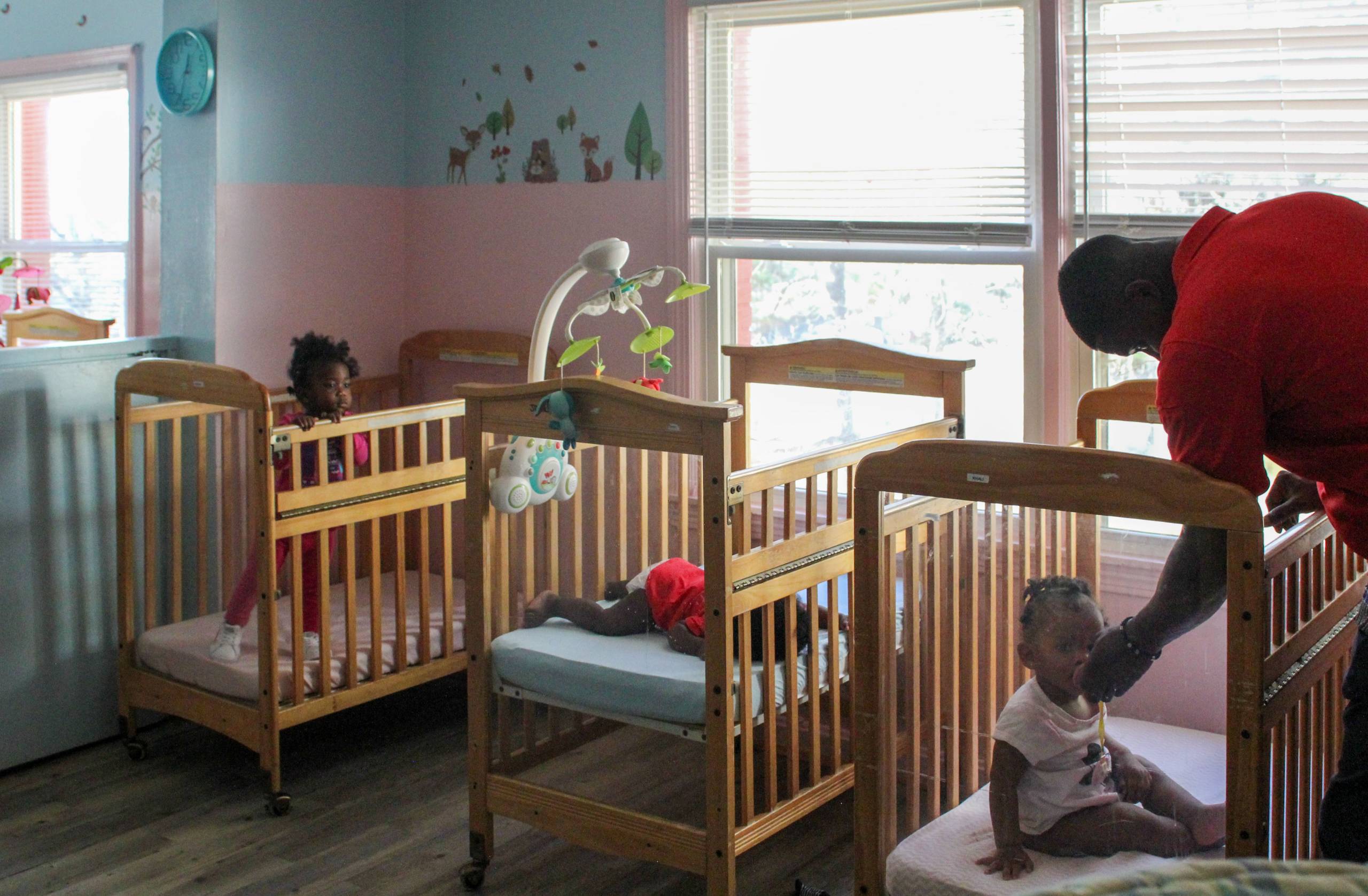 Toddlers nap in cribs