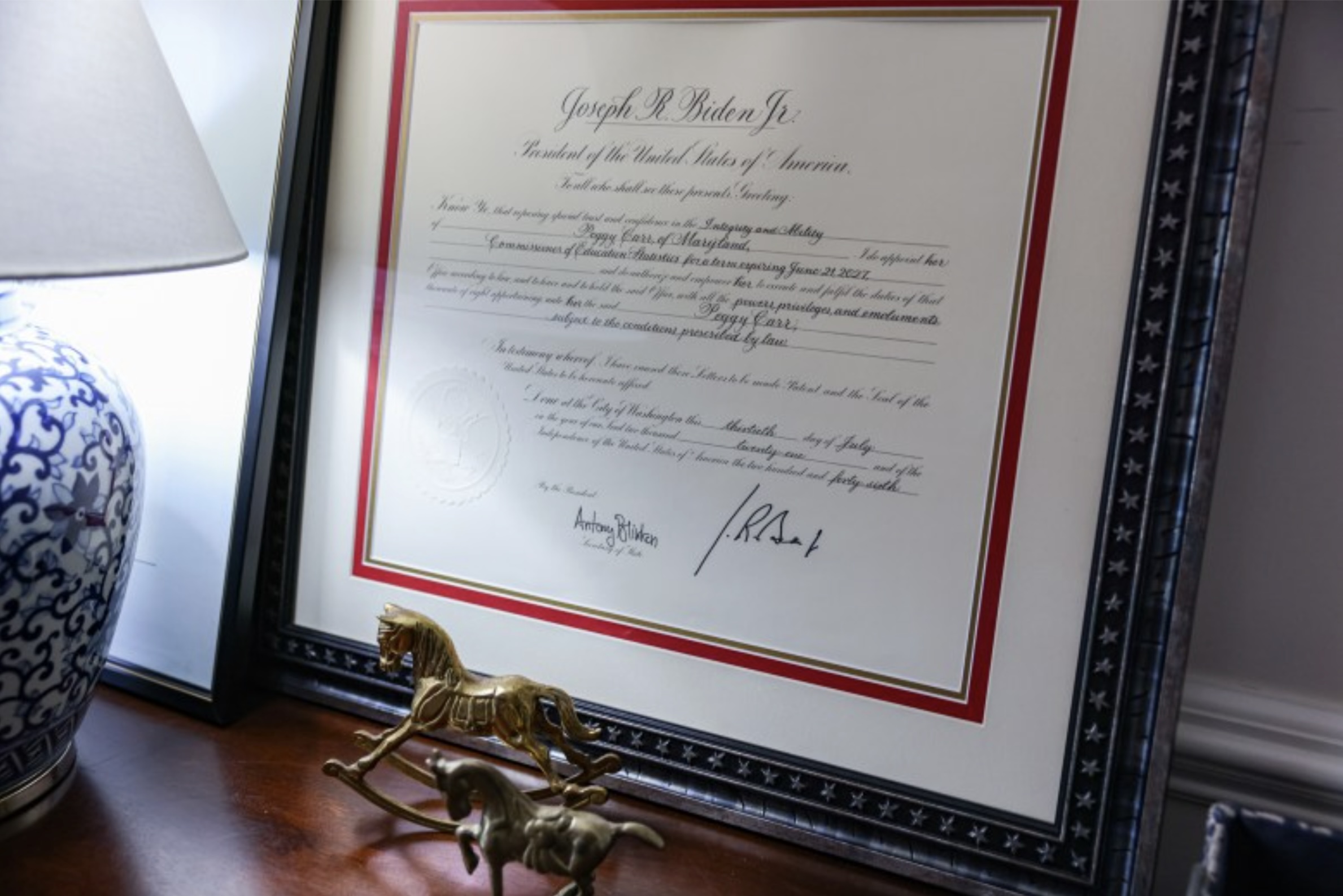 Framed document on a table