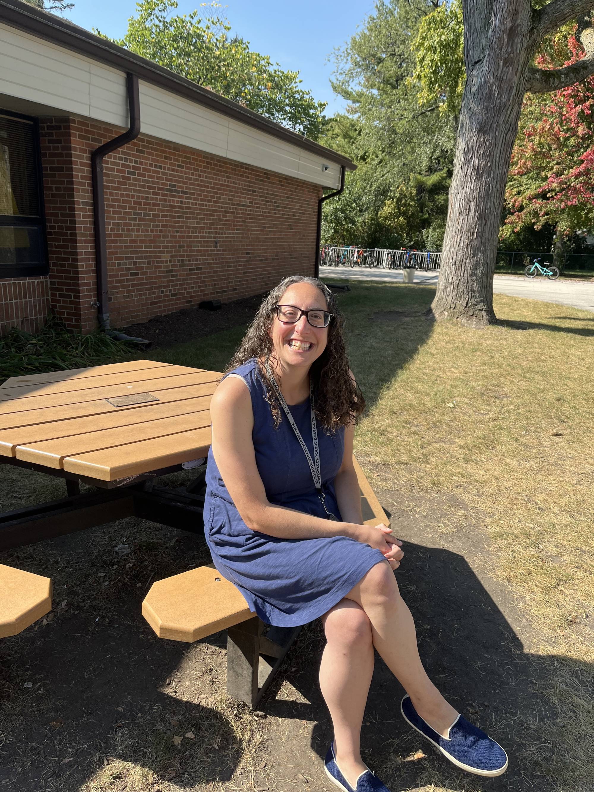 Woman sitting at bench