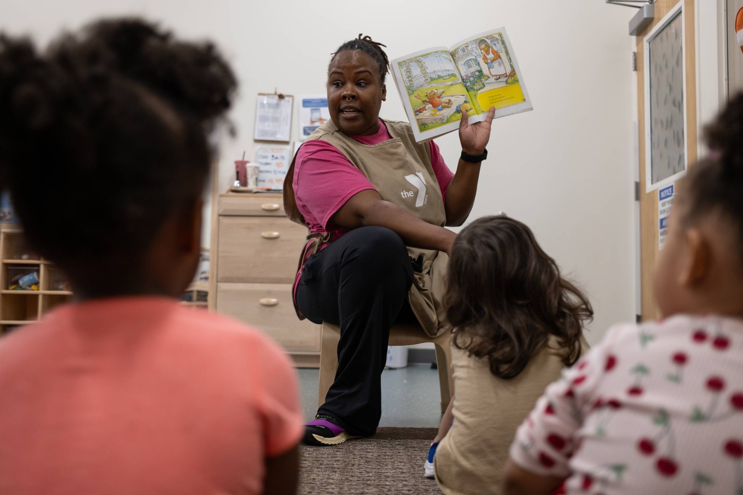 Teacher reads to kids