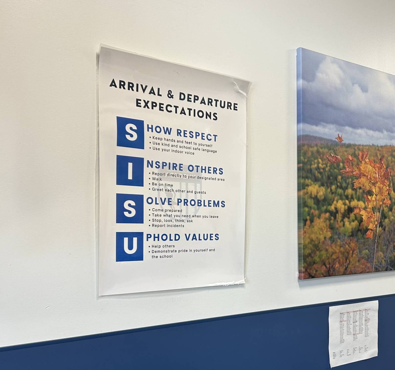 A poster is displayed on a wall