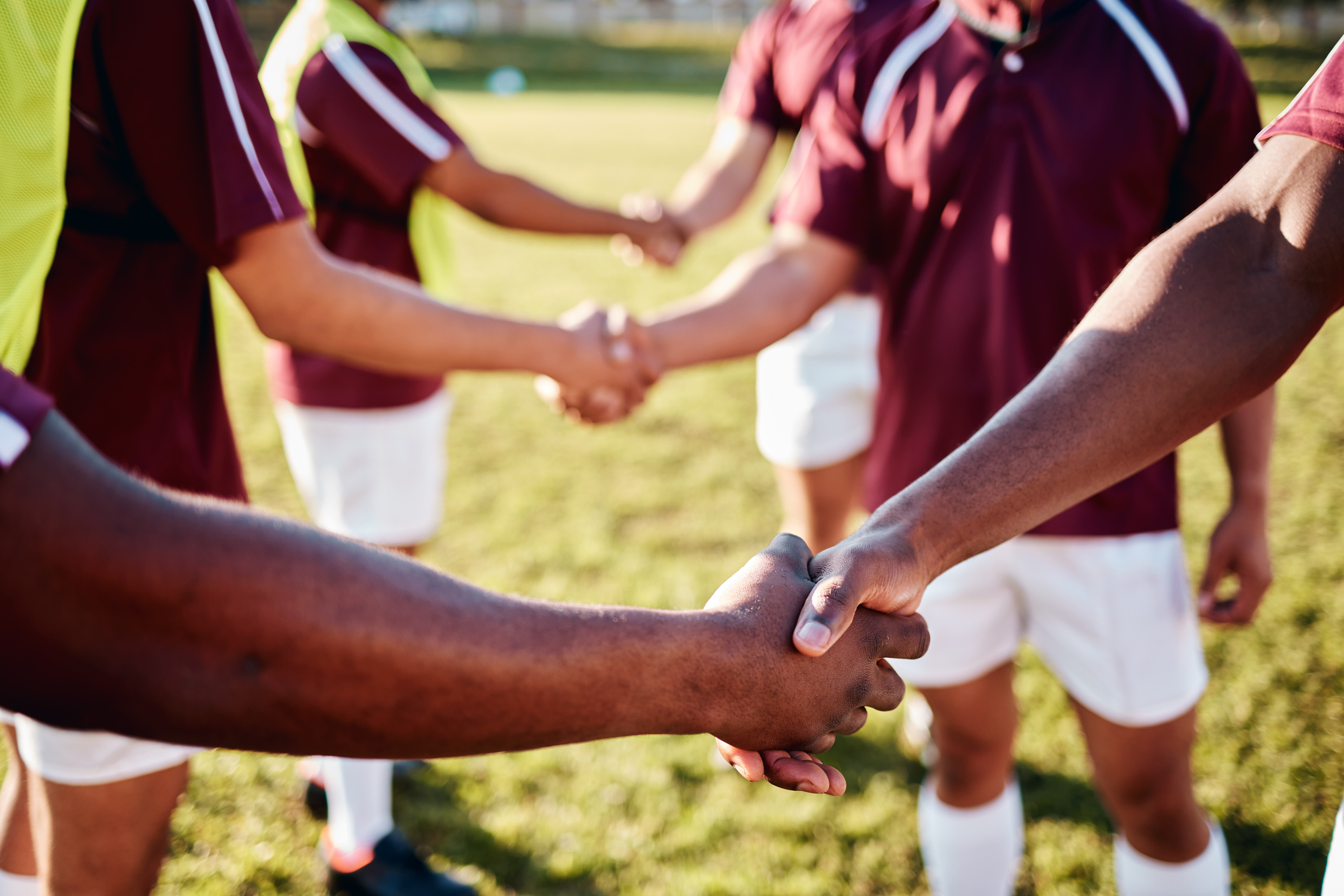 Soccer players shake hands