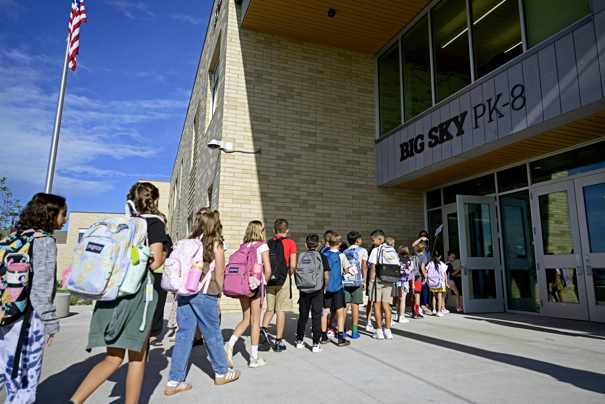 Students filter their way into the building during their first day of class.