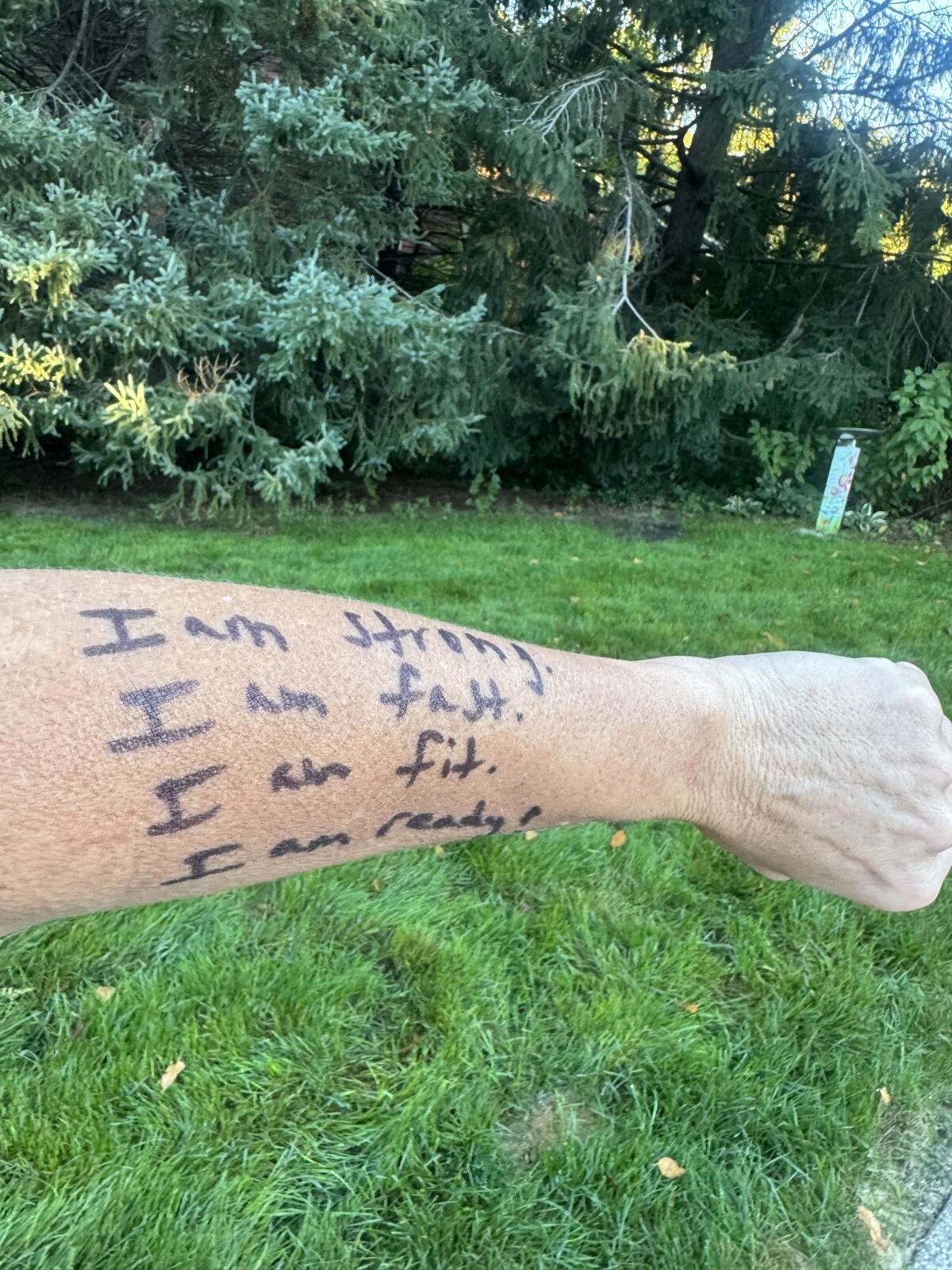 Kamphoff wrote these positive phrases on her arm to combat self-doubt during a 2012 marathon. She says they helped her run even faster — and she even went on to win the race in her division.
