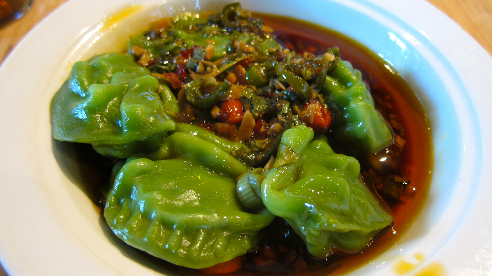Spinach Scallop Dumplings in Sichuan Sauce