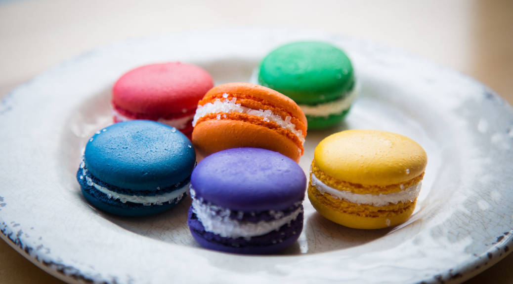 Among the Pride-themed Macarons are bellini and midori sour.