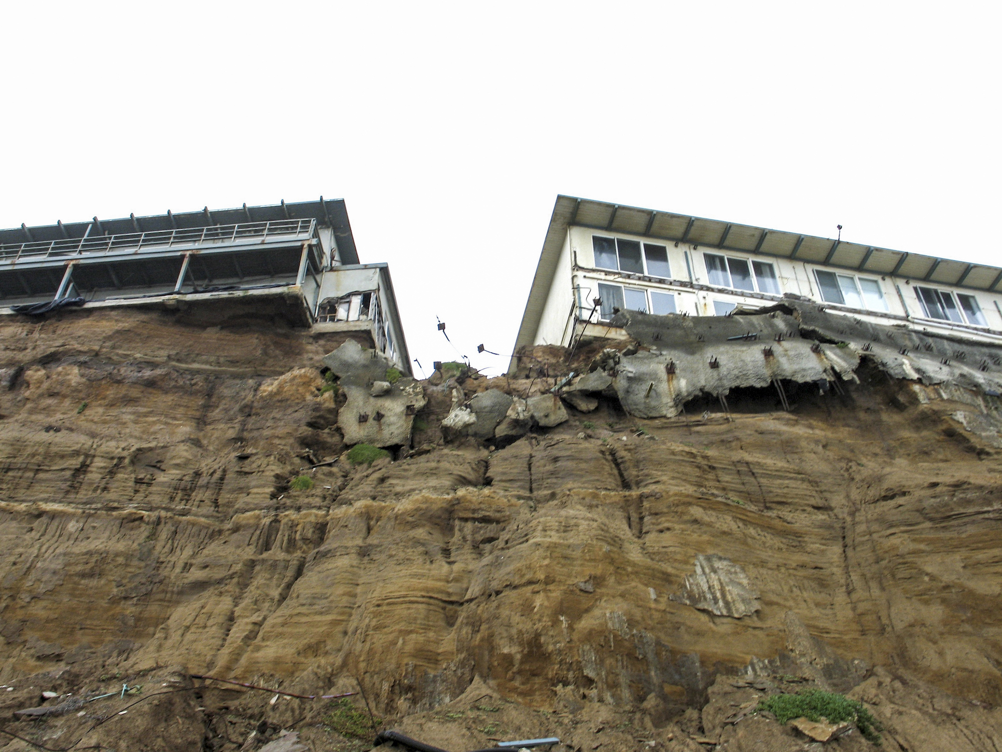 Eroding sea cliffs have forced the demolition of several apartment buildings in Pacifica.