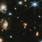 James Webb Telescope Captures Cosmic ‘Question Mark’ in Deep Space