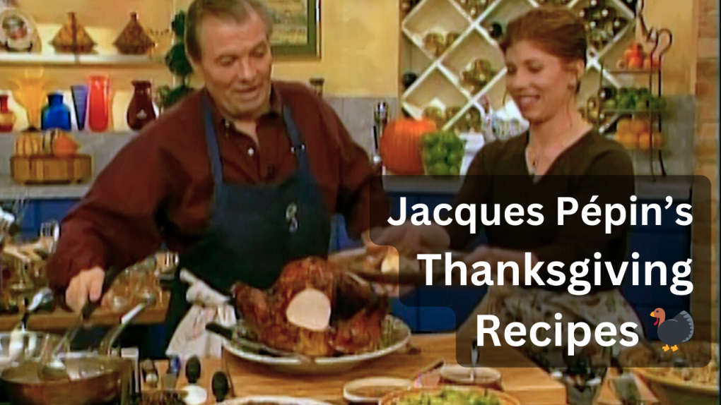 Jacques Pepin, an older white man in a blue apron, stand with his daughter Claudine, a young white woman with red hair, in front of a kitchen table full of Thanksgiving food