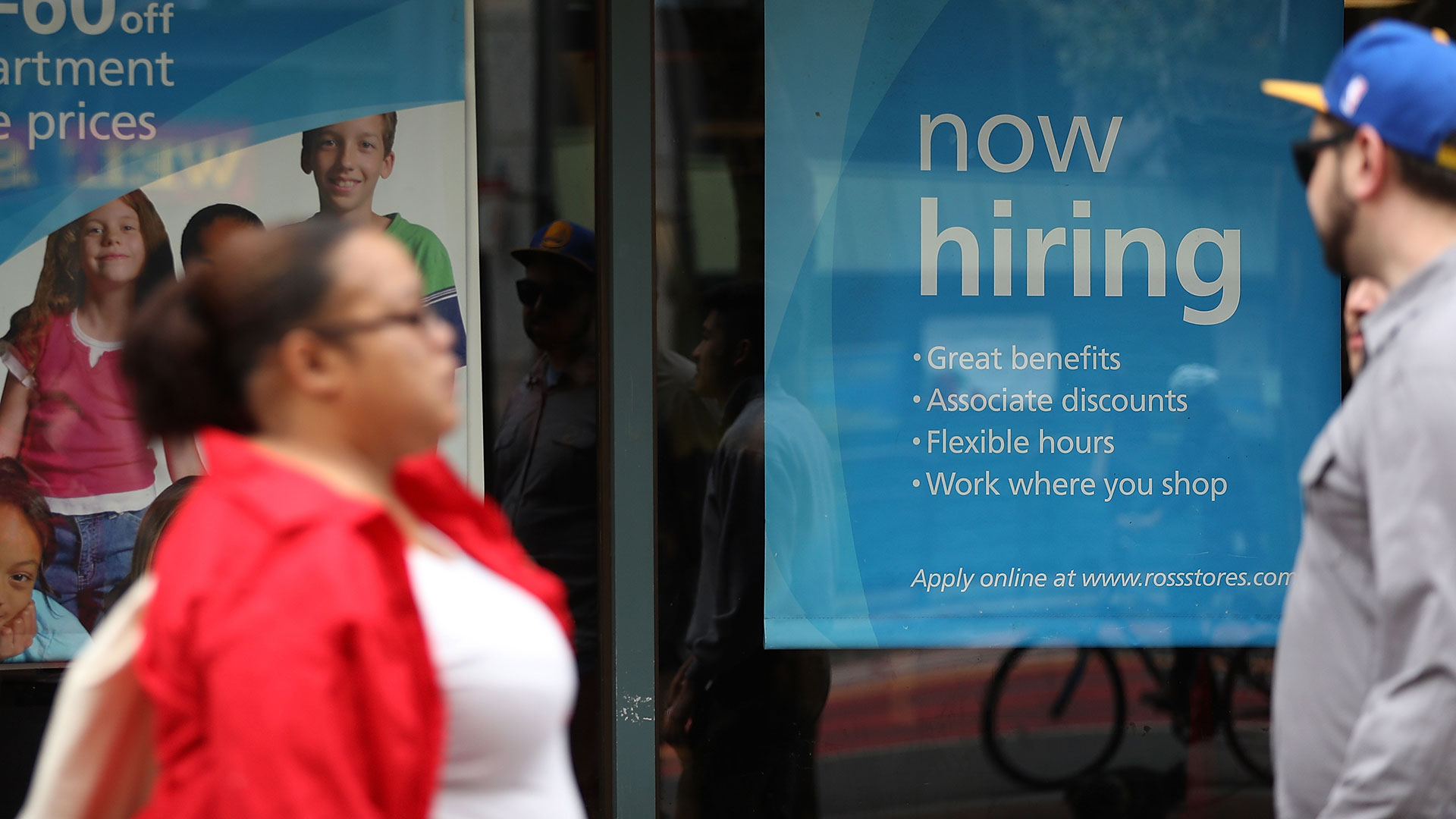 'now hiring' sign is posted outside of a Ross Dress for Less store on July 8, 2016 in San Francisco, California.