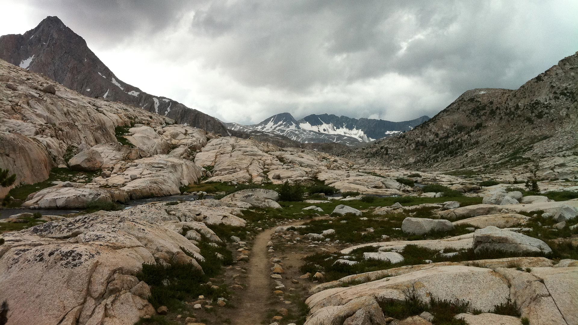 The John Muir Trail with mountains in the background.