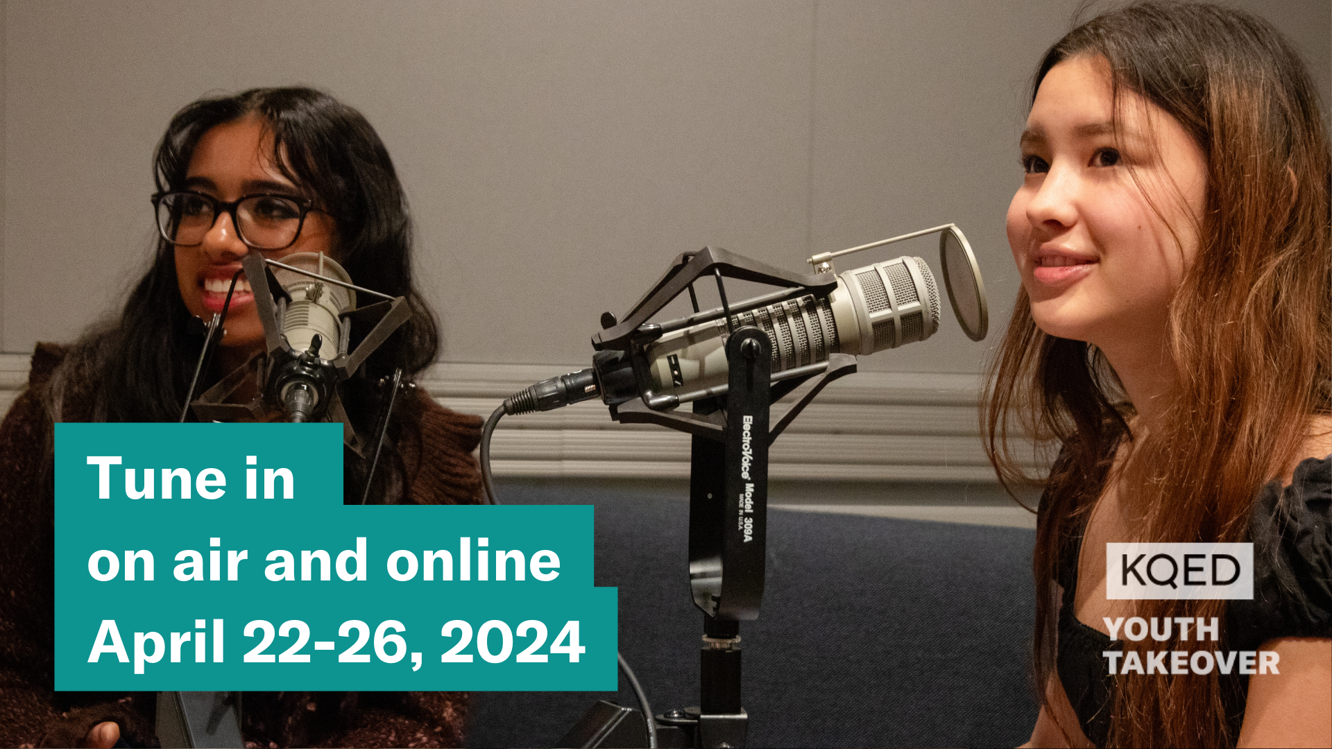 Two high school girls speak into microphones in recording studio