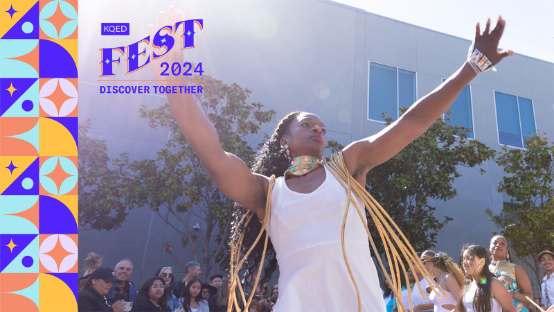 Image of a long-haired woman in a white dress with arms stretched wide dancing at KQED Fest.