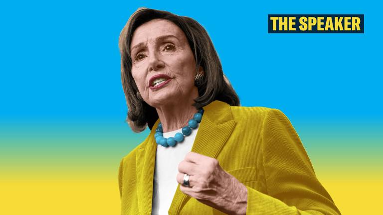 A portrait cutout of Nancy Pelosi positioned slightly left of center, shown from the chest up. She is looking slightly upward and toward the left, mid-speech, with a raised right hand clenching a loose fist. She wears a bright mustard-yellow corduroy blazer over a white top, a turquoise blue beaded necklace, and a metallic ring on her finger. The background features a smooth color gradient that shifts horizontally from bright sky blue at the top to vibrant yellow at the bottom. In the upper right corner, a dark navy blue rectangular box contains the title "THE SPEAKER" in bold, sans-serif yellow capital letters.